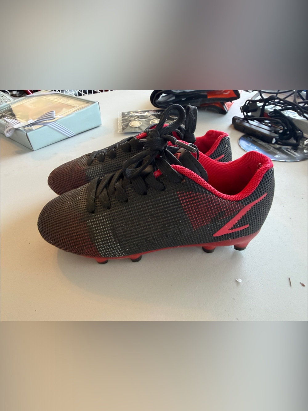 Kids Umbro Black and Red Soccer Cleats - Athletic Performance